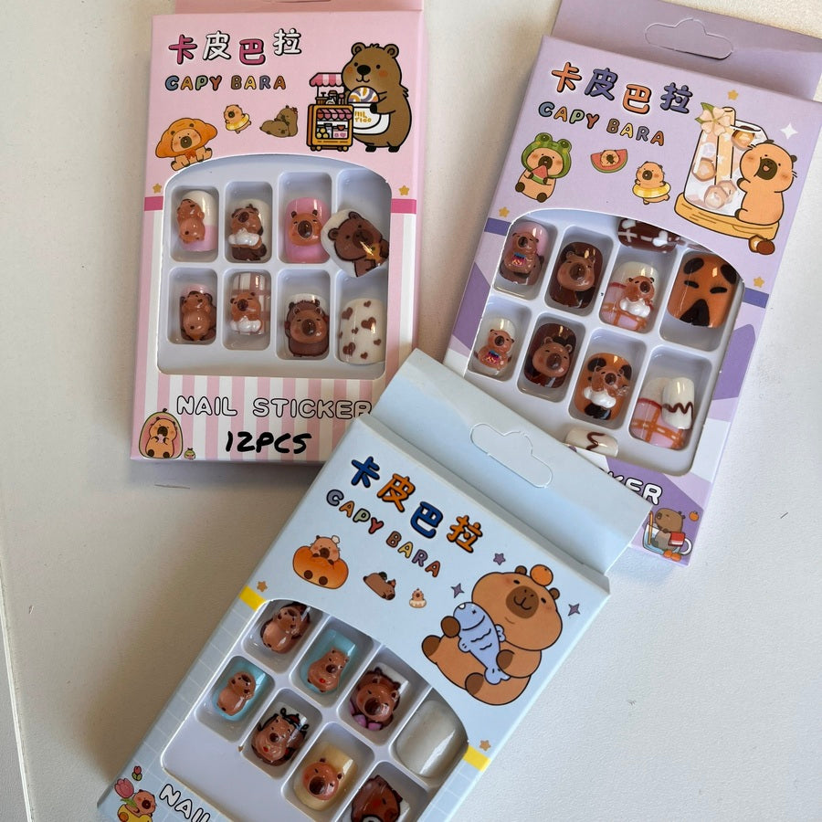 Uñas con acc para niñas capybara x1 unidad