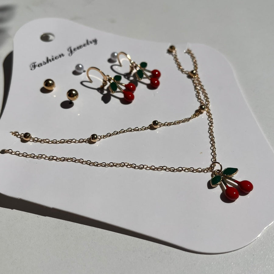 Set collares + caravanas cereza